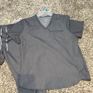 Size large only worn a couple of times job changed colors